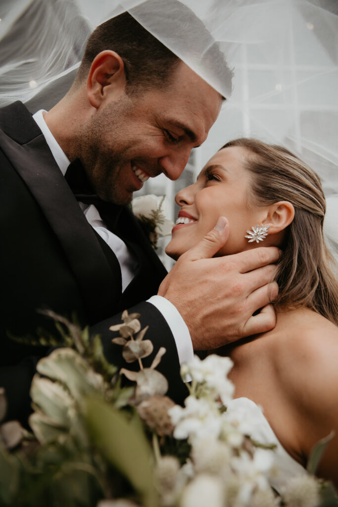 under the veil shot bride and groom wedding